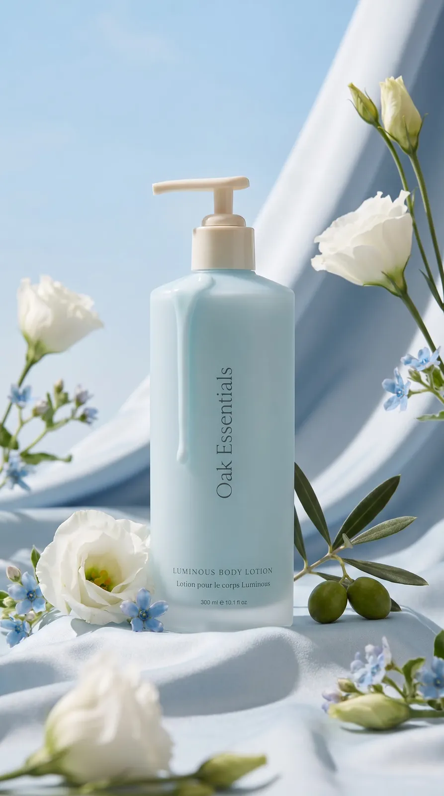 Body lotion bottle styled with white roses and silk fabric, beauty campaign visual